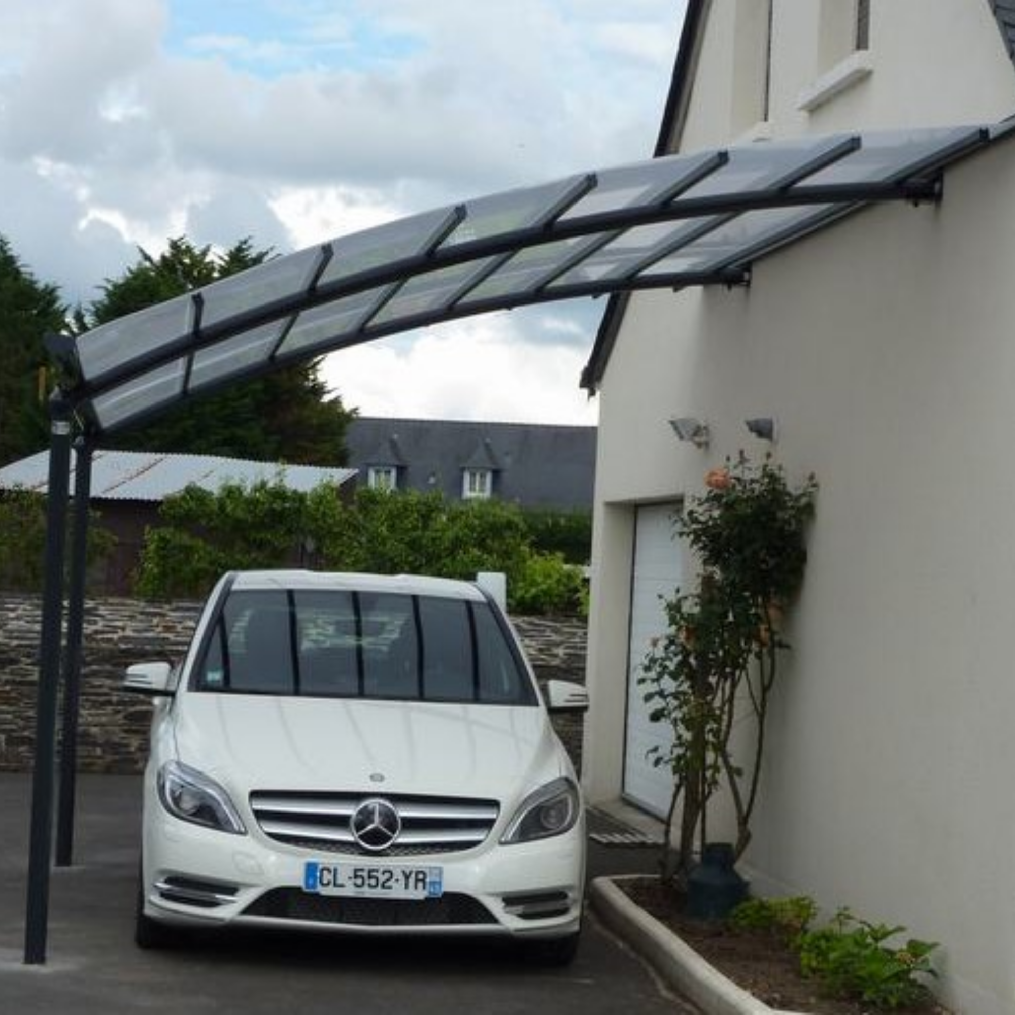 Abri terrasse toit en verre