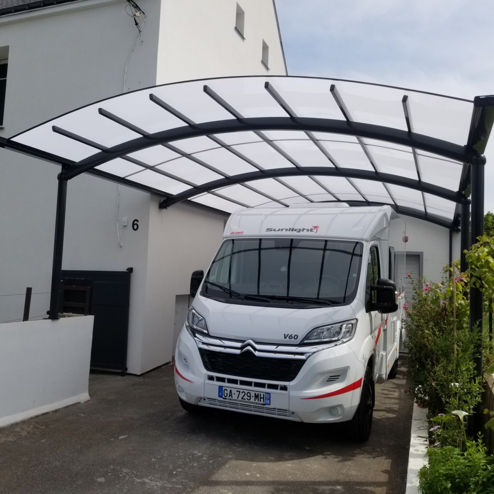 Terrasse avec toiture polycarbonate