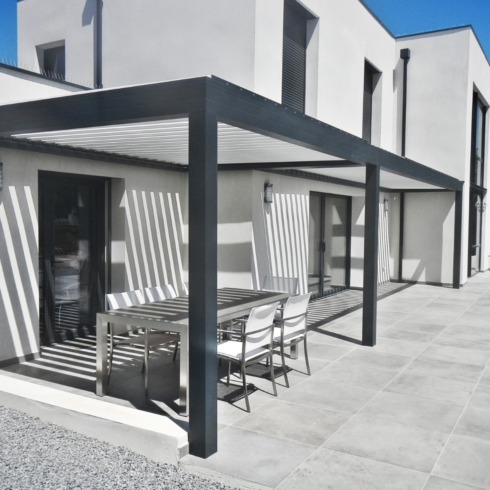 Abri terrasse toit en verre