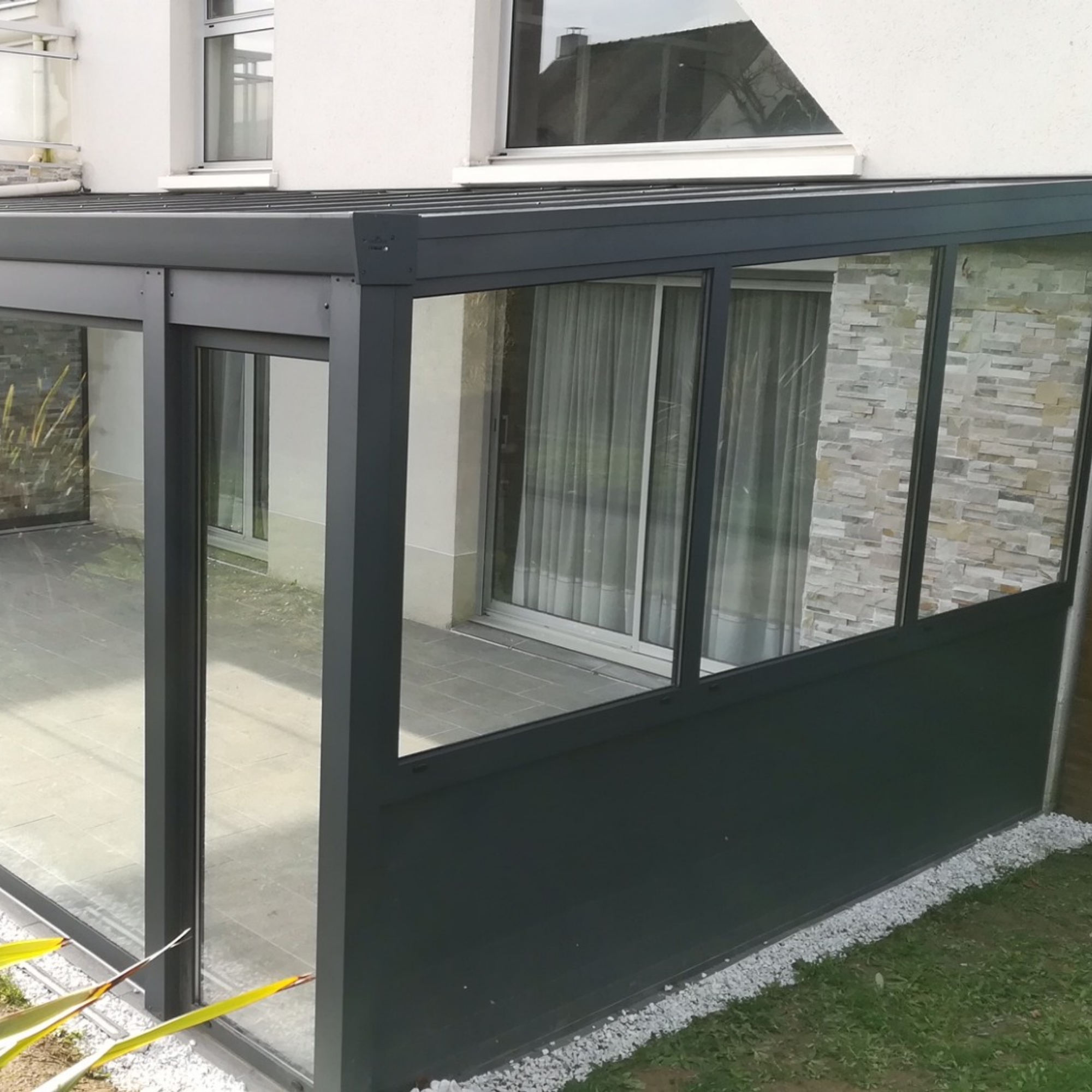 Terrasse avec toiture polycarbonate